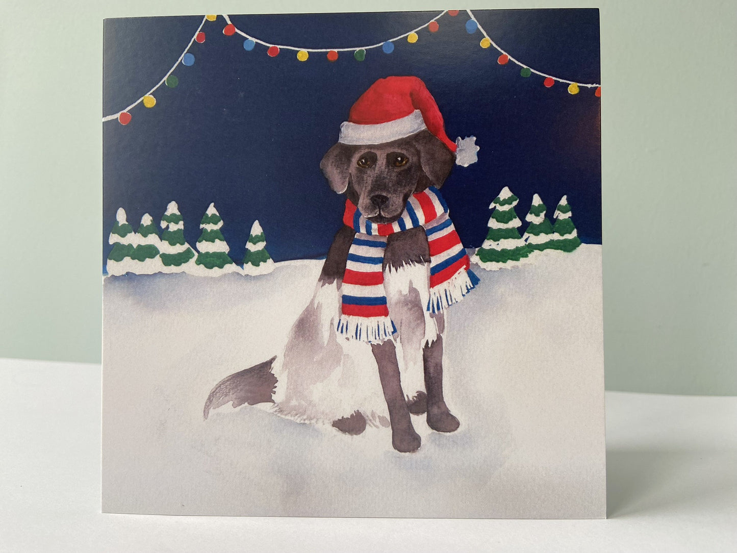 Christmas card Dog in the snow